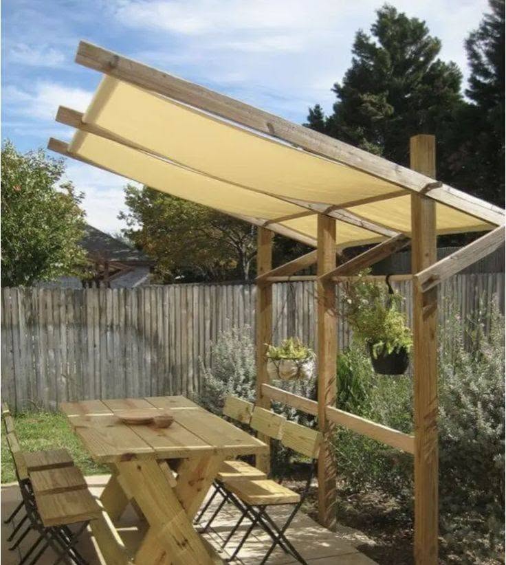 Modern wood pergola patio with outdoor dining area