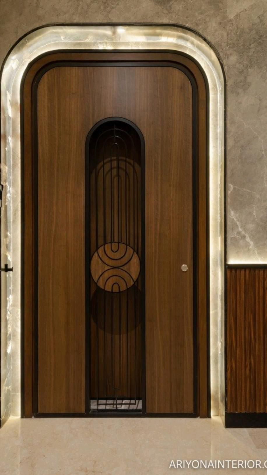 Contemporary Arched Wood Entry Door with Backlit Marble Surround