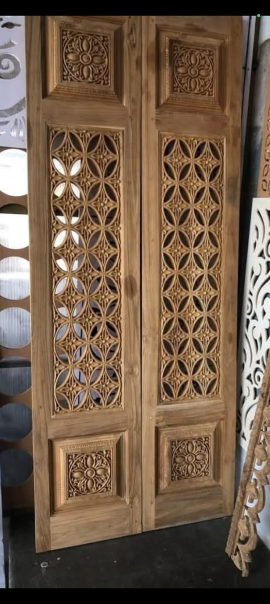 Intricately Carved Wooden Double Doors with Geometric Floral Panels