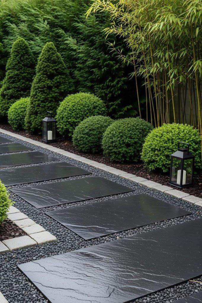 Modern Slate Stepping Stone Walkway with Lush Evergreen Border